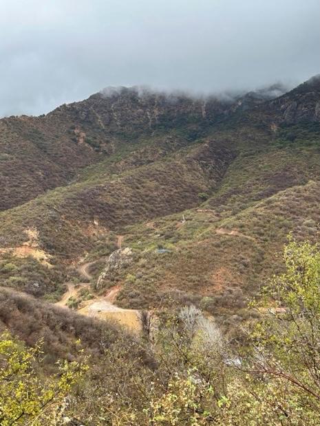 Clouds over the mountain valley at the Dios Padre Project